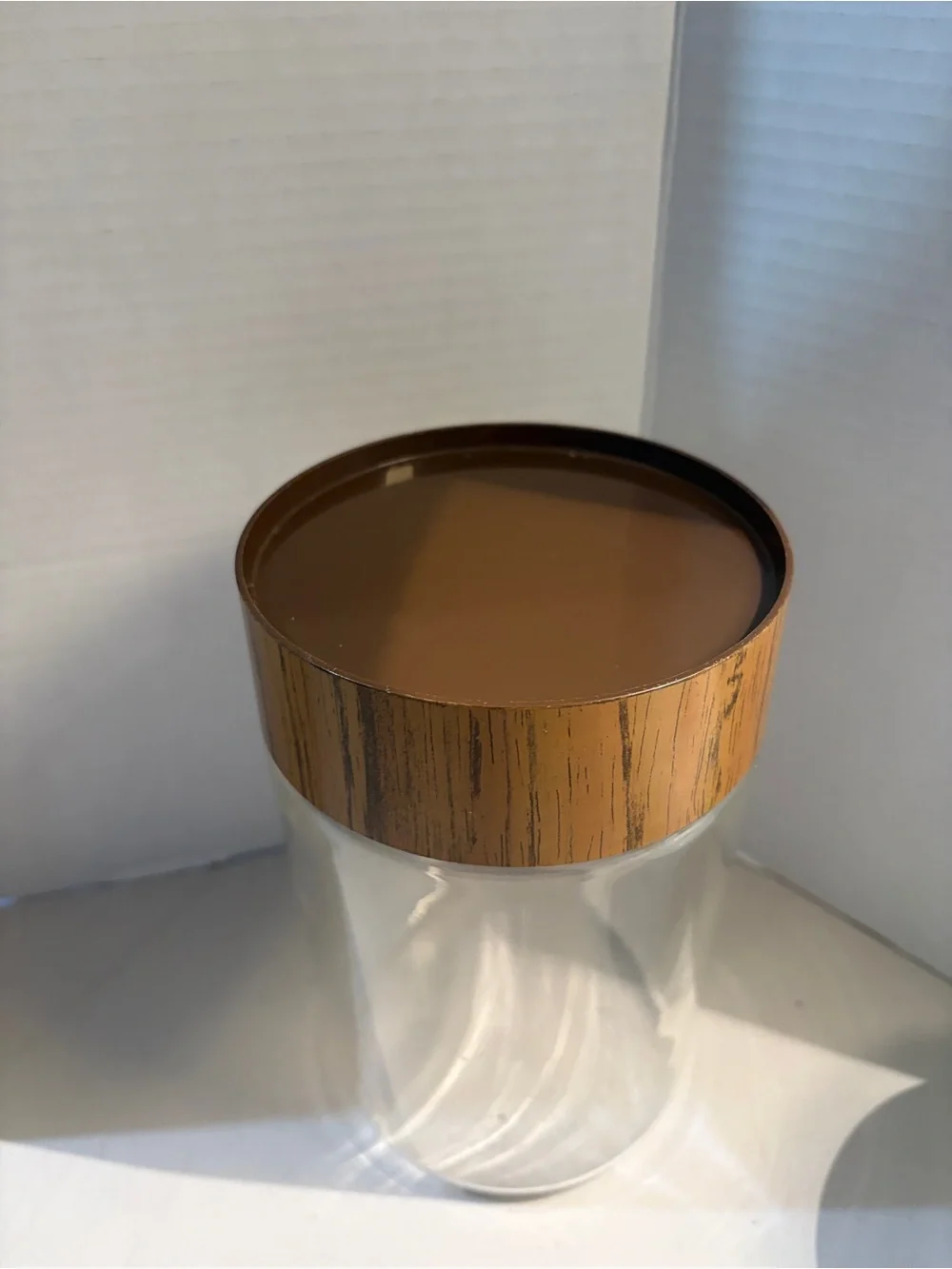 Vintage 1970s Pyrex canister with wood grain lid 7”